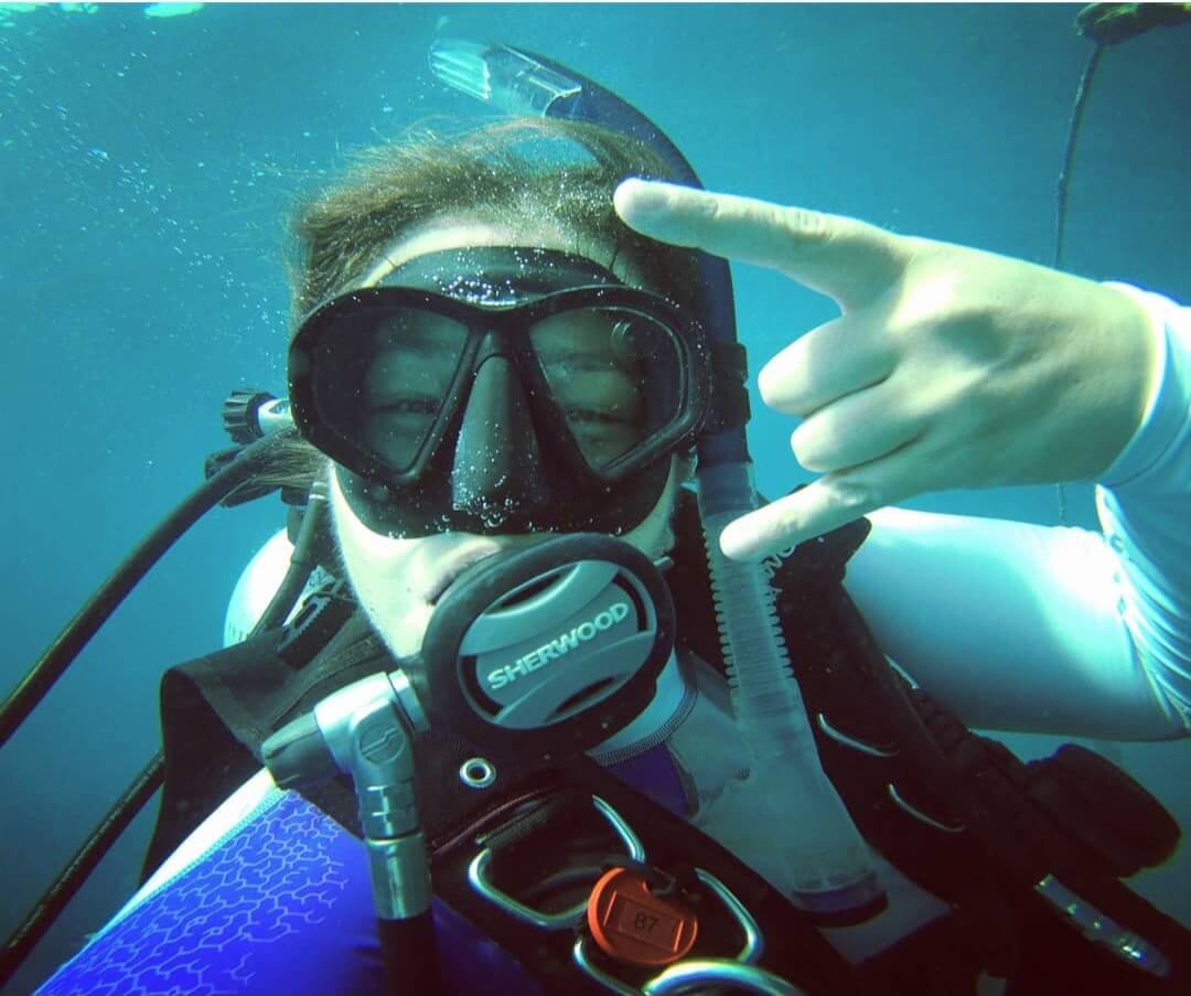 Maude diving in the ocean